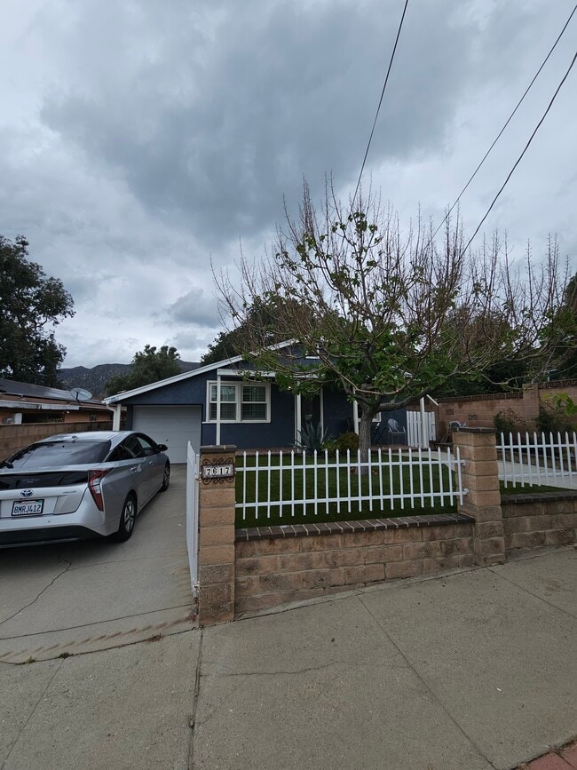 Gated front entrance - 7617 Wentworth St