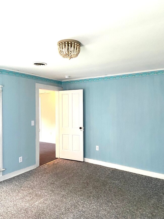 Unfurnished bedroom 2 view. - 76 N Main St Unit A2