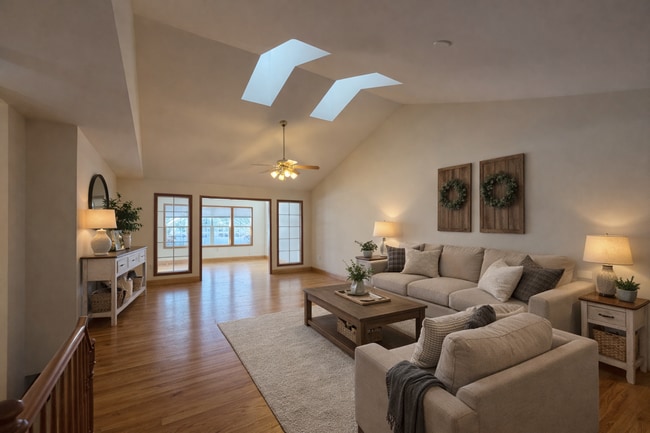 Building Photo - Spacious 3BR/3BA Condo with Finished Basement + 2-Car Garage — Available Now