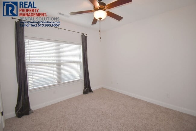 Photo - All brick 4 bedroom home plus Bonus room! Garage and covered patio!