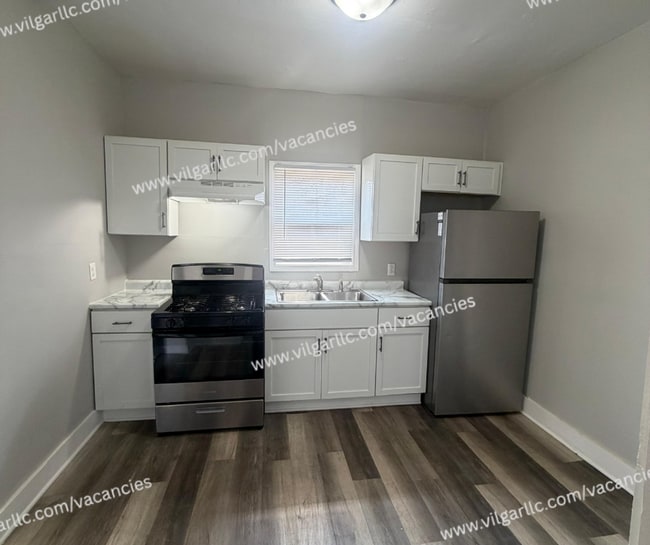 Building Photo - Spacious • 3 bedroom  • 1 bath