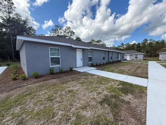 Building Photo - 9541 N Travis Dr