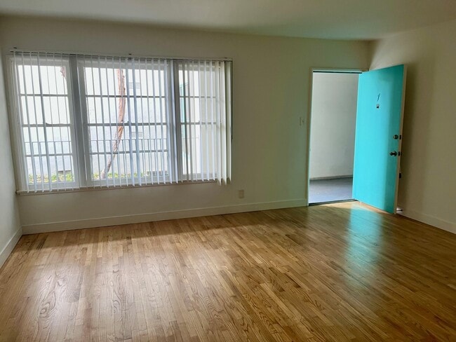 living room to door and window view
