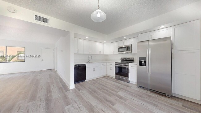 Building Photo - 8420 SW 133rd Avenue Rd Unit 212
