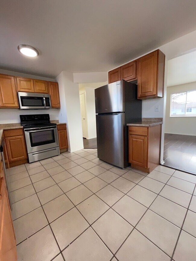 Photo - West Jordan Four Bedroom; Garage; New Kitchen Cabinets; Fenced Yard; Central Air