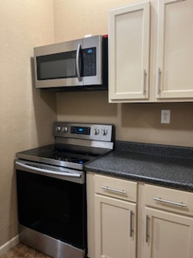 Photo - Spacious 4 Bed Home-Freshly Painted, New Roof, Stainless Steel Appliances, located on a Corner Lot