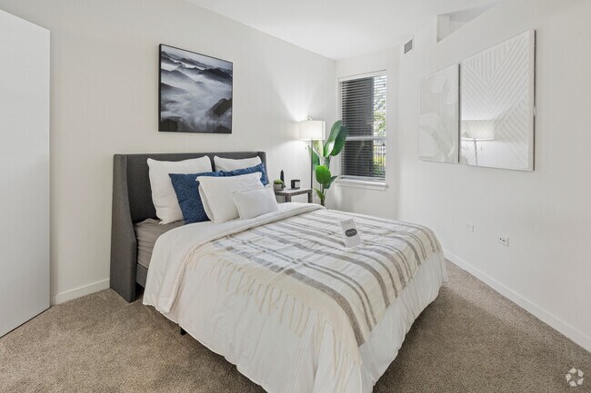 A1 1BR, 1BA - 715SF - Primary Bedroom