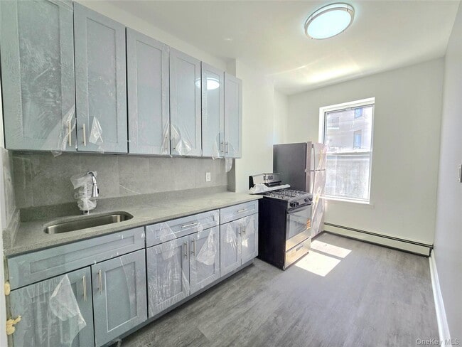 Photo - 56-46 Myrtle Ave Unit 3