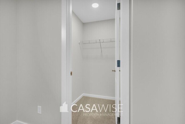 Photo - 21107-21125 25 Ave NW