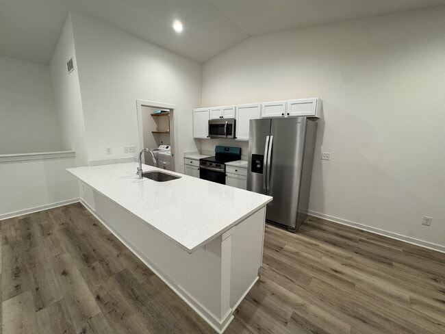 Photo - "Spacious 5-Bed Oasis with 3 Full Baths in Charming Bel Aire - 2,624 Sq Ft of Comfortable Living!"