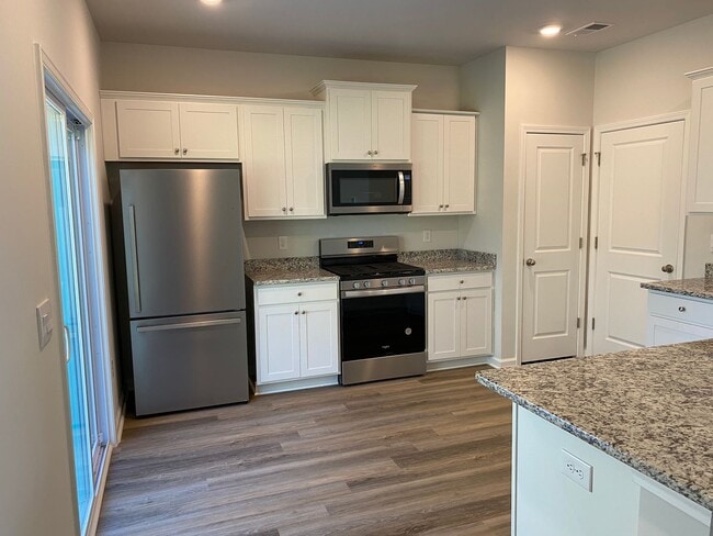Photo - Now Pre-Leasing for August 2026: 3BR Home at The Retreat at East Argent