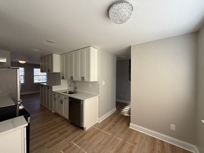 Photo - New Everything 4BR Townhome with Private Lower Level Suite | Stainless Kitchen | LVP + New Carpet...