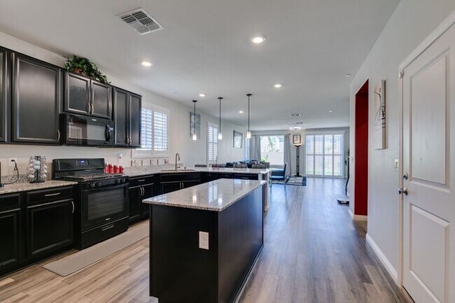 Photo - Furnished 5-Bedroom Home with Two Primary Suites