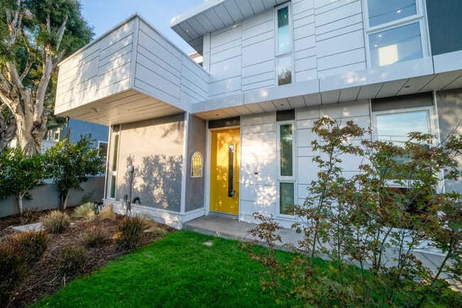 Front of the building with grassy area - 2306 Aviation Blvd Unit A Rental