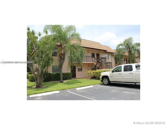 Building Photo - 10437 NW 11th St Unit 202