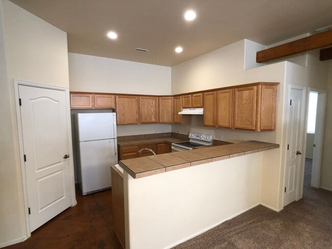 Photo - Well-Maintained 3-Bedroom Townhome with 2-Car Garage in Desirable Location!