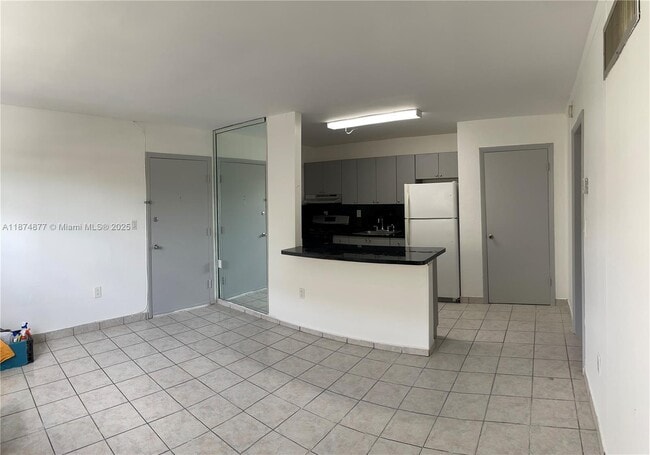 Building Photo - 465 S Royal Poinciana Blvd Unit 1B Rental