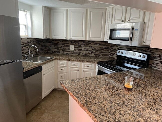 Building Photo - 8255 Lake Dr Unit 401