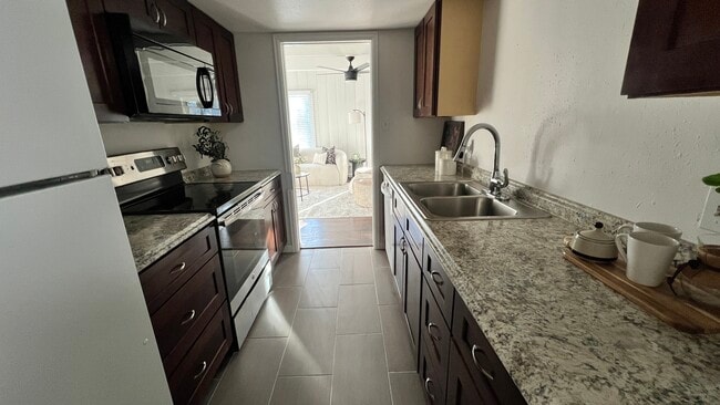 Galley Kitchen - 9725 E Harvard Ave Unit T323