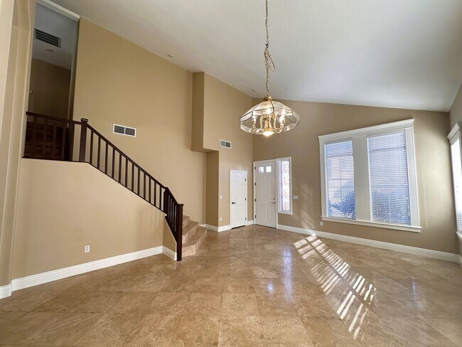Photo - Gorgeous home with travertine tile flooring in the Rhodes Ranch guard gated community! The kitche...