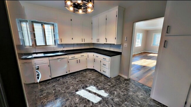 Photo - Charming Newly Renovated 3-Bedroom Rental with Garage & Basement