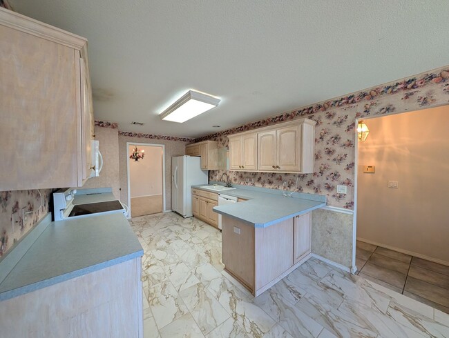 Photo - Spacious 3-Bedroom Duplex with Modern Comforts and Room to Roam!
