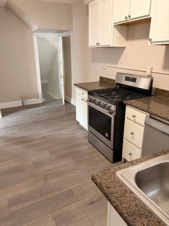 Photo - Huge townhome available. Four bedrooms three bath.