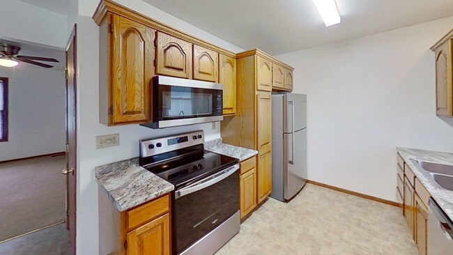 Photo - Duplex with two large bedrooms, walk in closet, 1.5 bath, full basement, lawn and snow removal in...