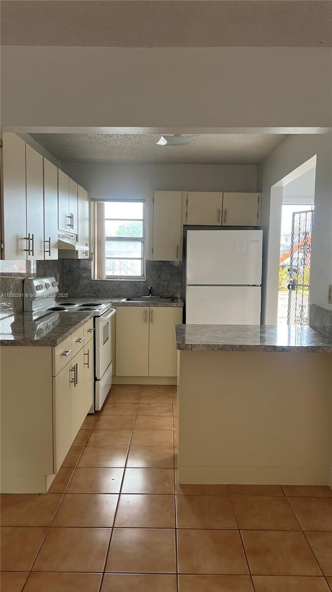 Photo - 120 W 9th St Apartment Unit 104