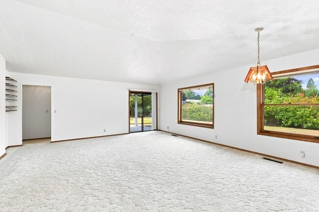 Photo - Charming 3-Bedroom Home with Garage & Lawn Care Included