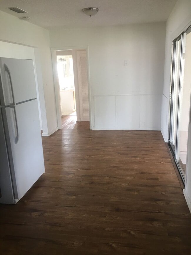 Photo - Spacious 4BR Home with Fenced Yard, Screened Patio & Updated Interior – 1,354 Sq Ft