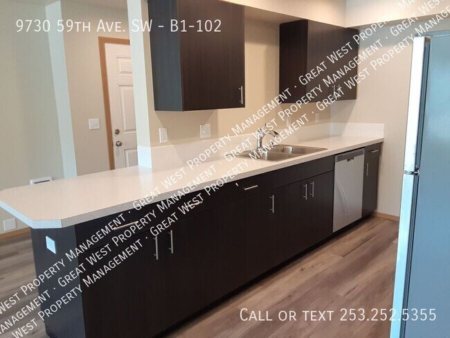 Building Photo - 9730 59th Ave SW Unit B1-102