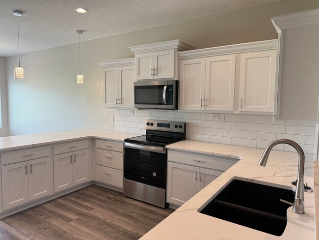 Photo - Ranch townhome with 2 stall garage. Spacio...