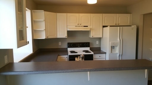Photo - Charming 2 BR/2BA Townhome in Prime Rockrimmon Location!