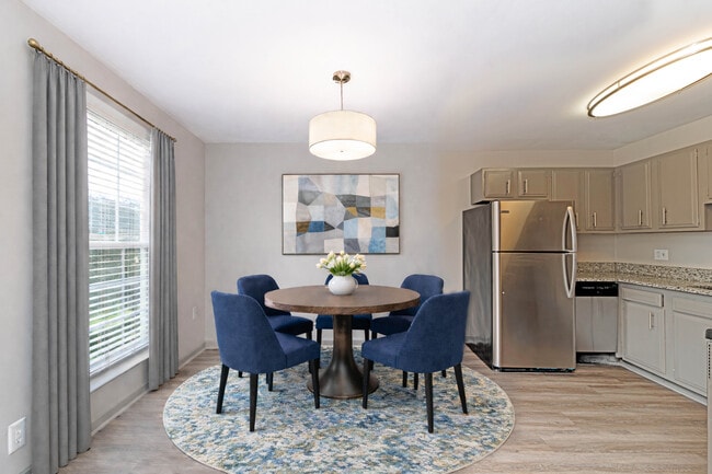 Dining area with hardwood-style flooring