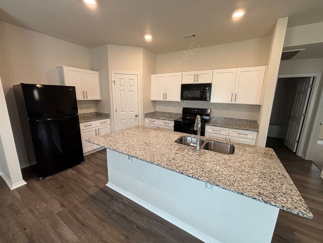 Photo - Move in special $300.00 off 1st month's re...