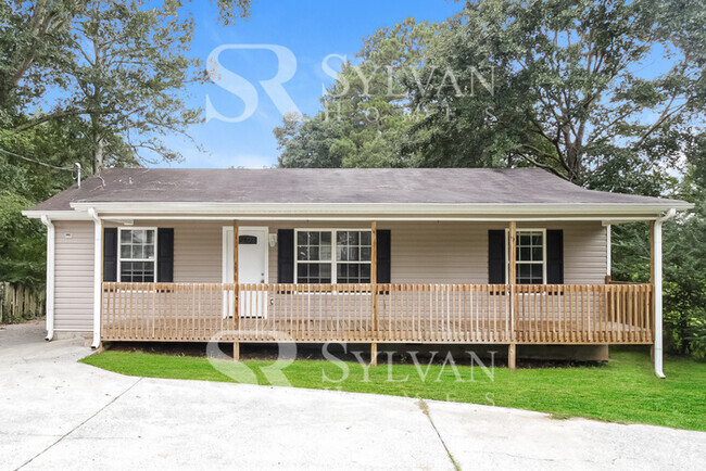 Building Photo - Enjoy the Coziness of this Darling Home