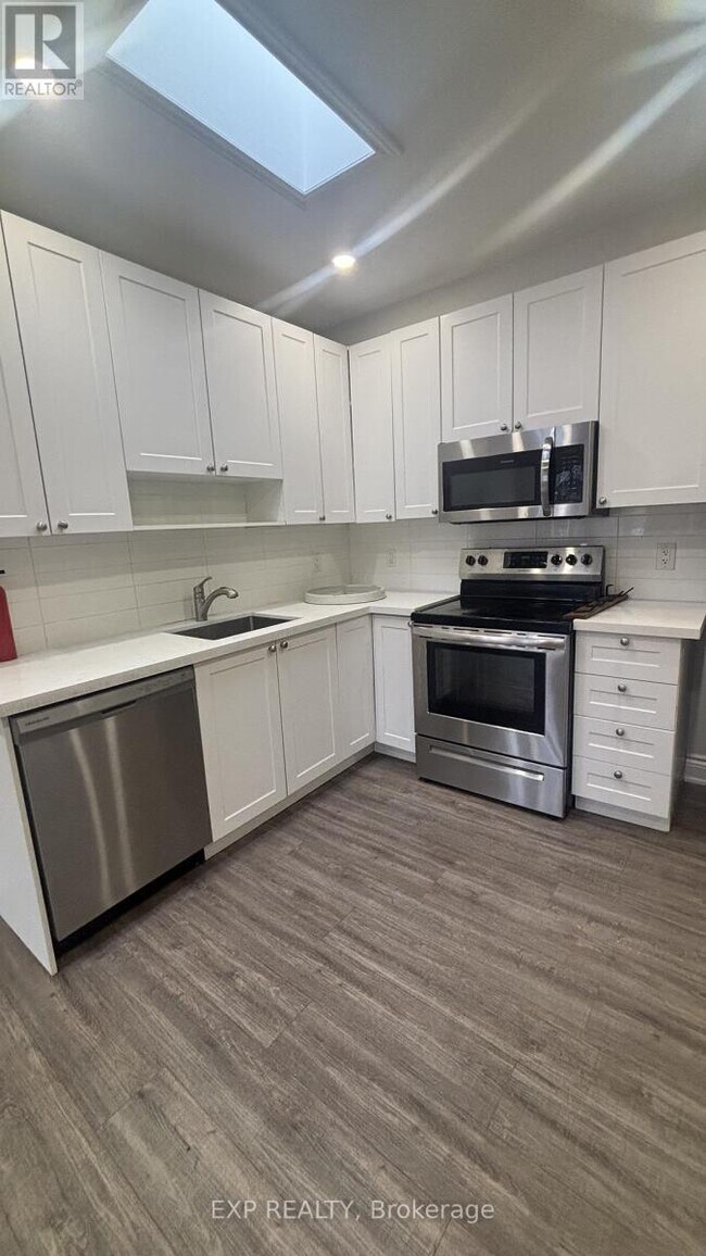 Photo - 3289 Lake Shore Blvd W Unité 1