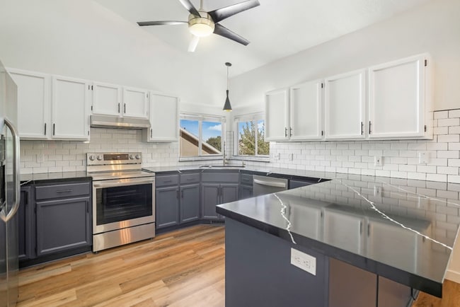 Photo - Modern 5 Bedroom Home with 3Car Garage in Sandy Neighborhood