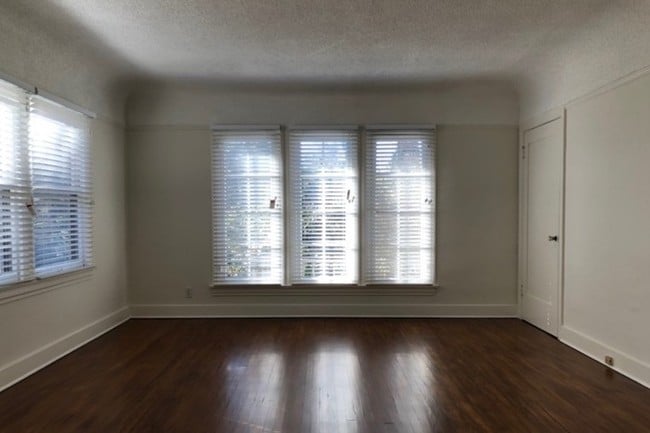 Huge bright Hardwood floor Living room.
