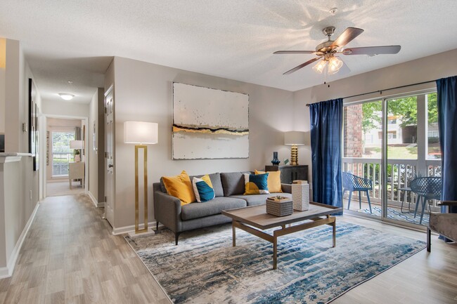 Living Room with Hardwood Flooring - North Park at Eagle's Landing Apartments