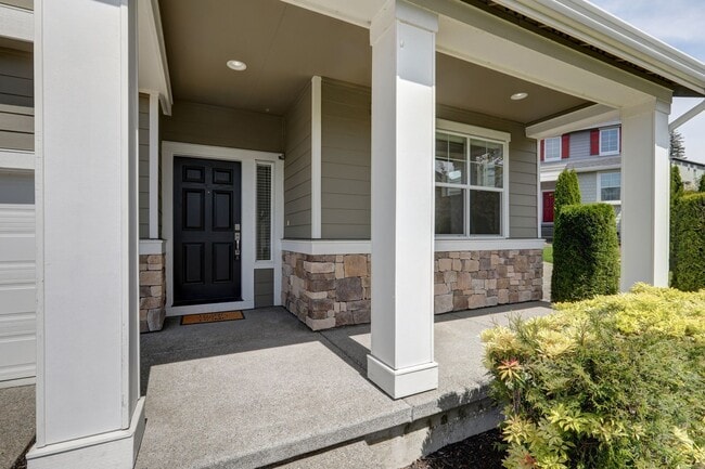Photo - 4 Bedroom Home with Open Den, Living & Family Rooms – Space for Everyone