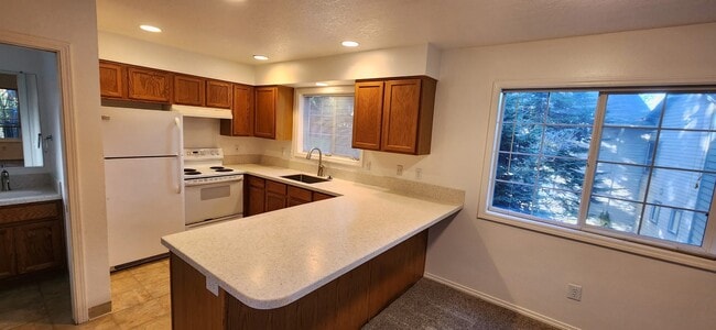 Kitchen with new countertops and sink - 12331 SE Whitcomb Dr. Unit #2