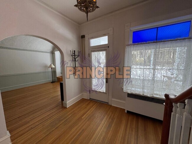 Photo - Charming Three-Bedroom Home with Garage and Yard