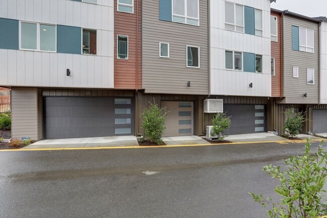 Photo - Live Where Style Meets Convenience – 2BR Townhome + Garage