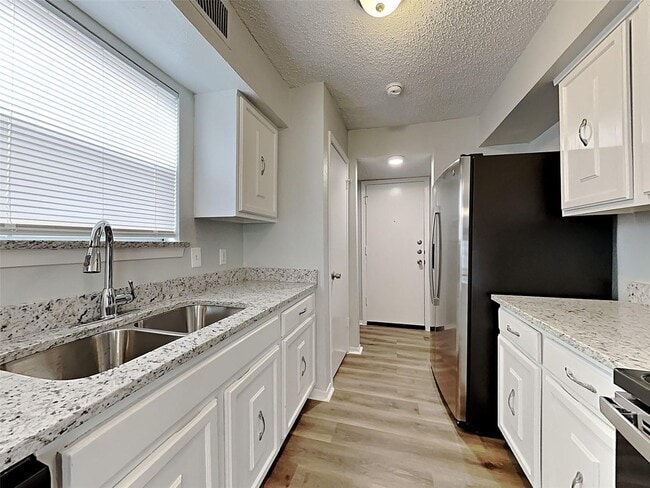 Photo - 3 BR/2BA | Renovated Single Family Home | 2-Car Garage | Gated backyard