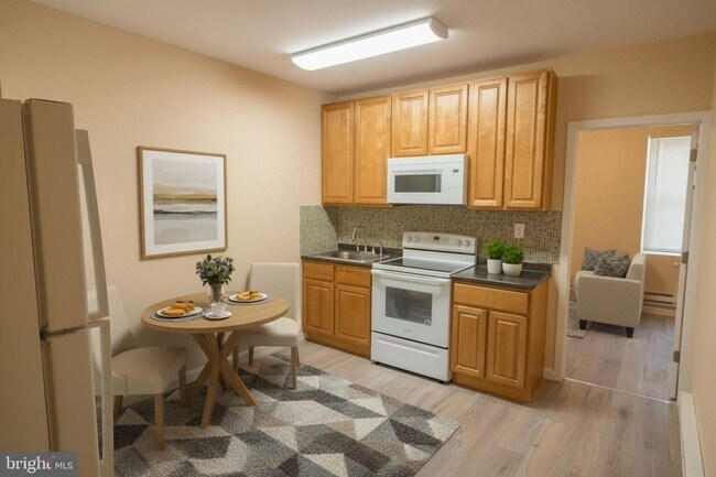 Building Photo - 6002 Master St Unit 2F