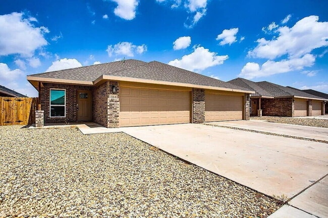 Building Photo - Spacious 3-Bedroom Duplex with Open Living Areas! Unit A