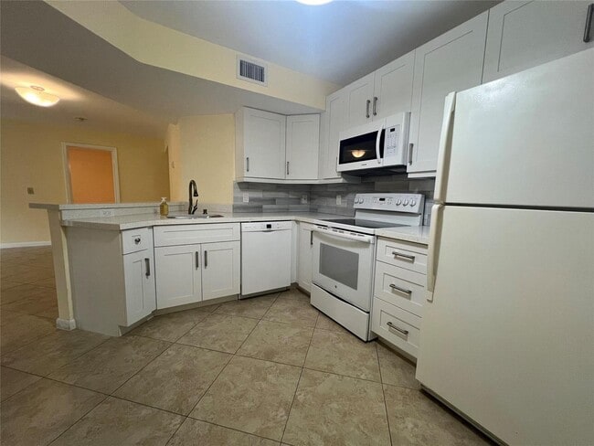 Photo - 8977 Wiles Rd Unit 206