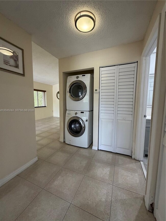 Building Photo - 13302 SW 152nd St Unit 3008